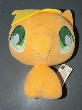 Hasbro Yellow Plush Character with Green Eyes